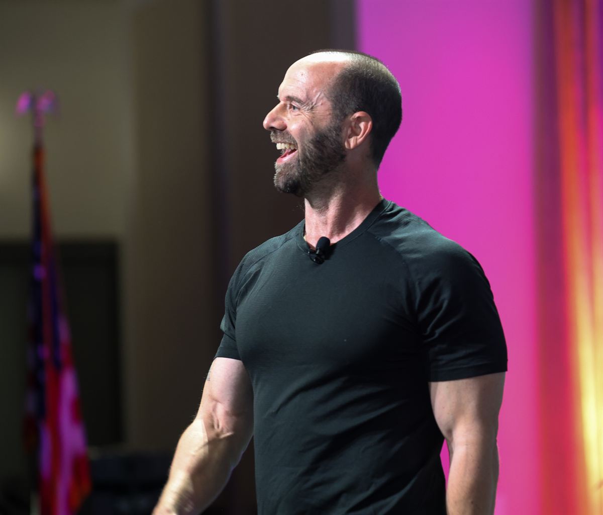 Todd Kashdan laughing on stage